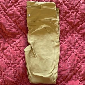 Lululemon running leggings with back zipper pocket. Length 28”